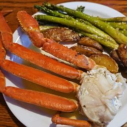 Captain George's Seafood Restaurant signature dishes Alaskan Snow Crab Legs
Oysters Rockefeller
Salmon Dinner